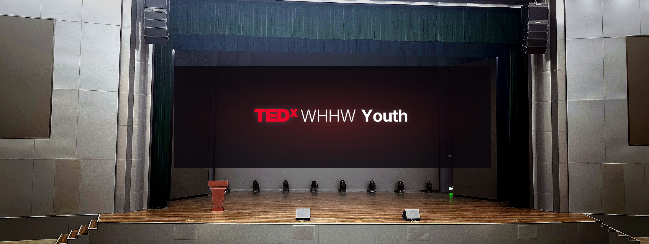 Wide central view of the auditorium facing the stage