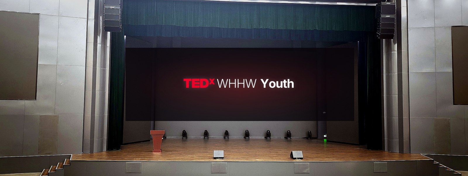 Wide central view of the auditorium facing the stage